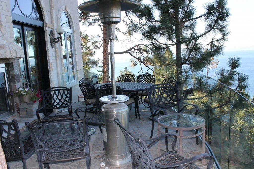 Frameless glass railing with Lake Tahoe visible straight through the panels